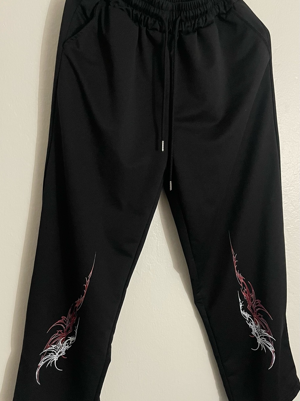 Men's Black Track Pants with Red & White Feather Graphic